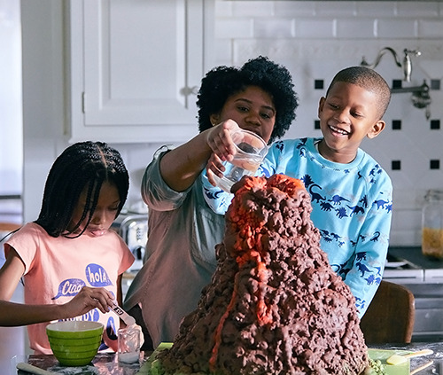 Family doing science homework image