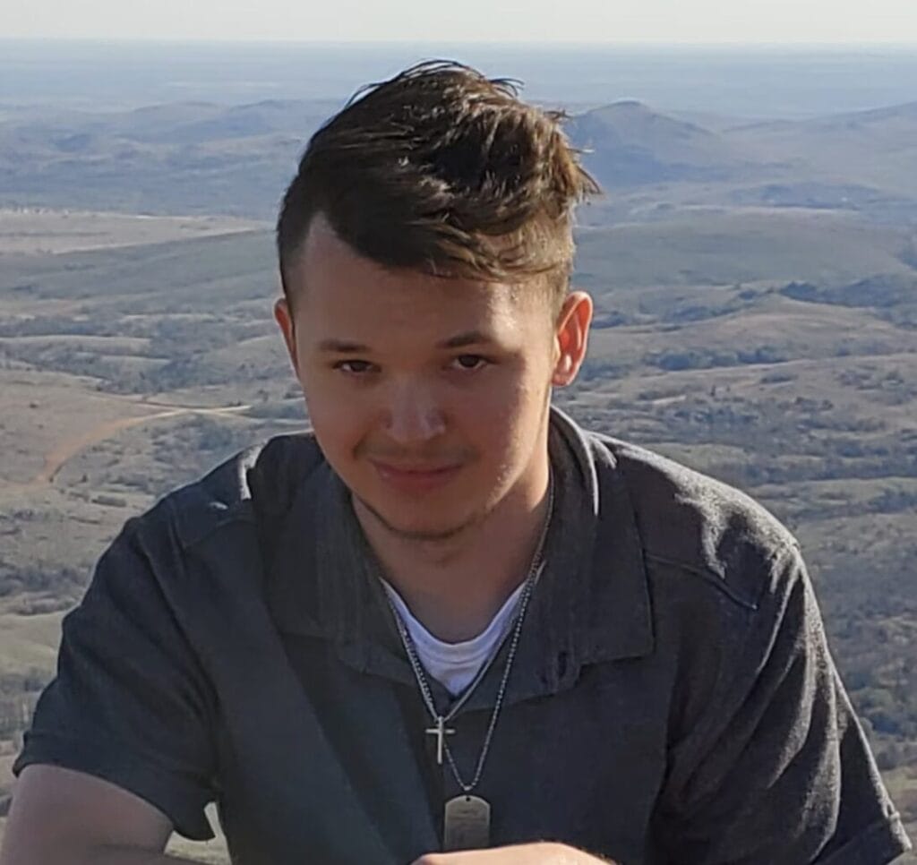 Boy on a hill